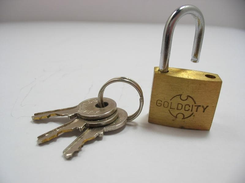Stylised lock and circuit imagery representing clinical cybersecurity