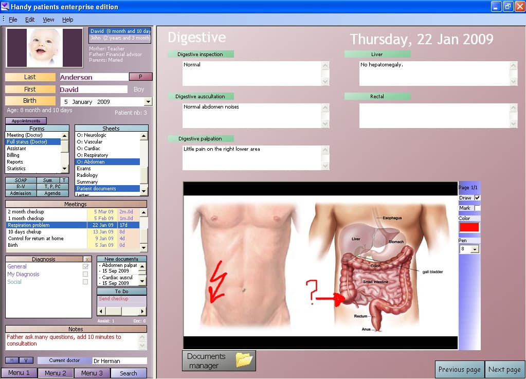 A clinician reviewing an electronic medical record on a desktop computer